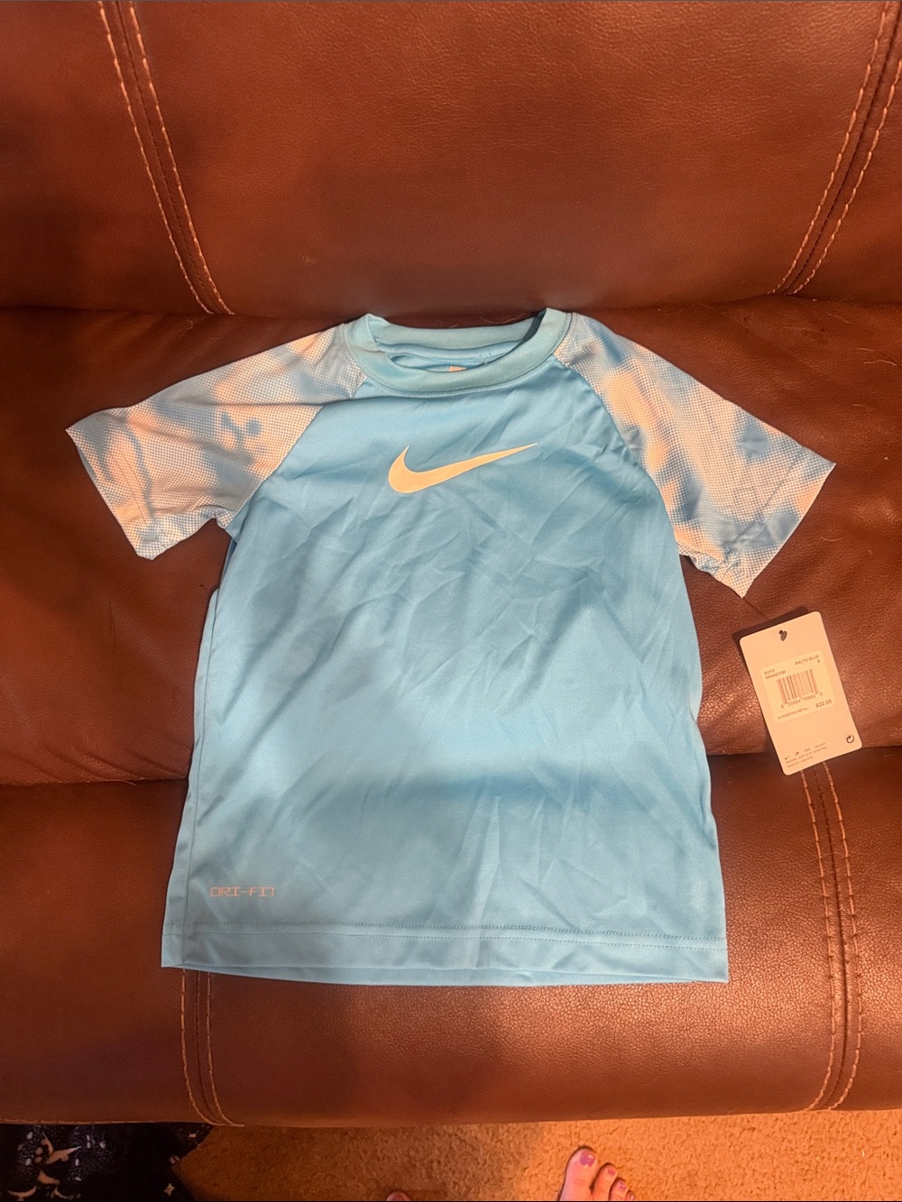 Nike Light Blue Short Sleeve Athletic Tee with White Swoosh